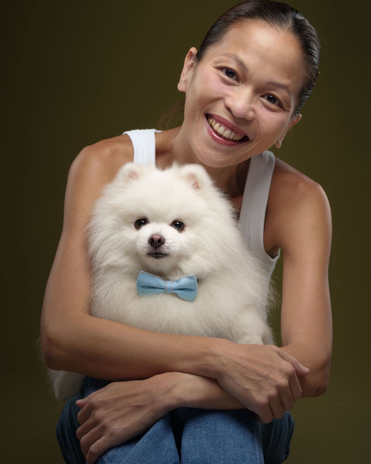 Pomeranian pet portrait with owner in Metro Manila
